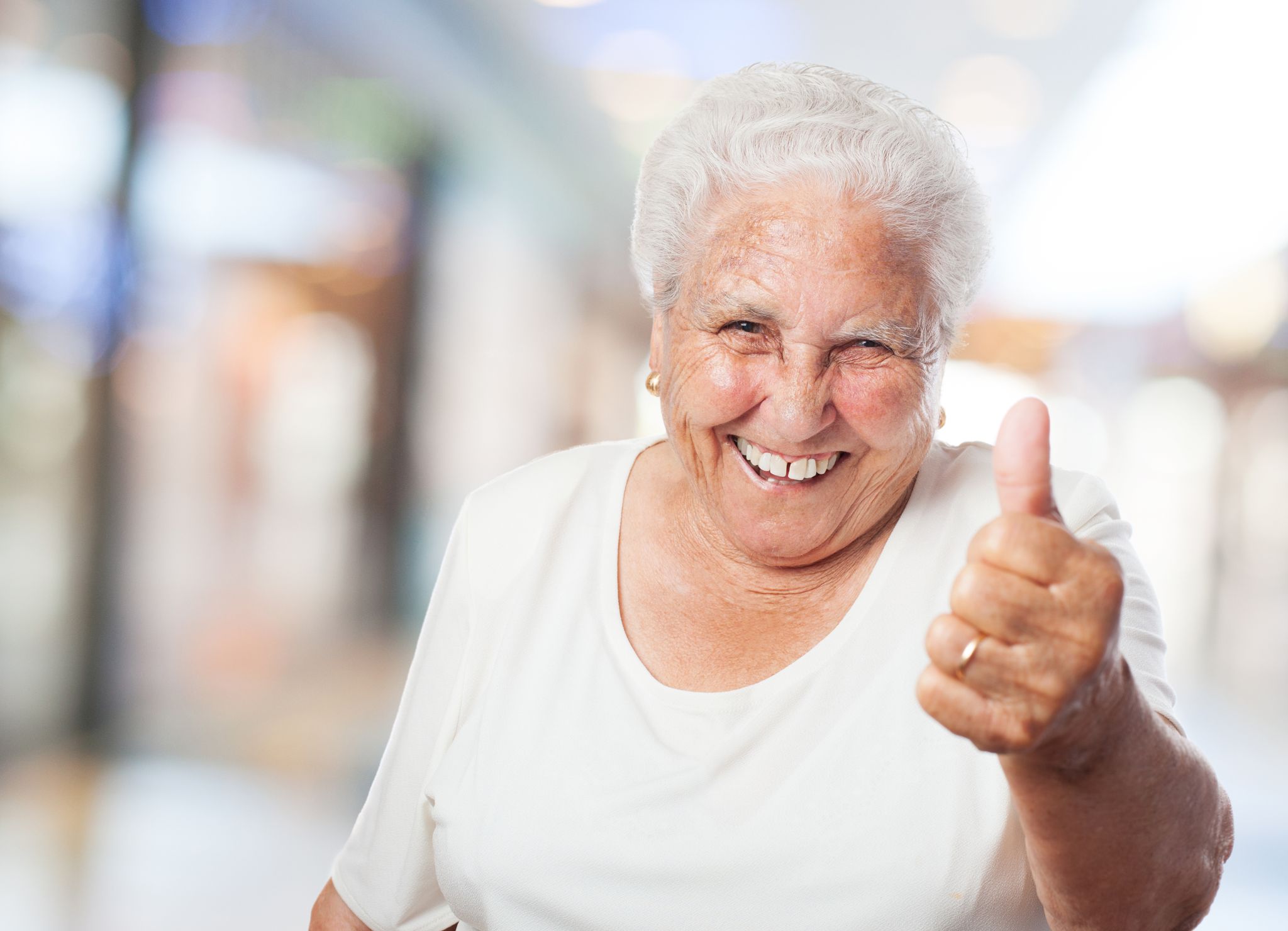 Tagespflege Grandma With Thumb Up